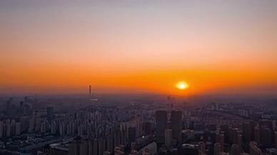 4K航拍城市高楼日落延时摄影视频的预览图
